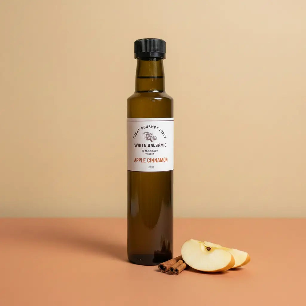 Apple Cinnamon White Balsamic Vinegar 250ml bottle on warm terracotta surface
