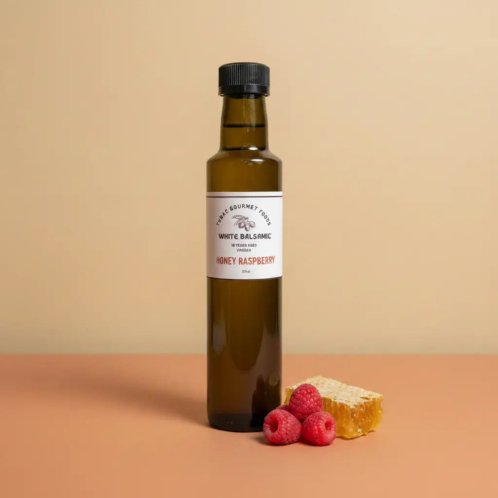 Honey Raspberry Dark Balsamic Vinegar 250ml bottle on warm terracotta surface